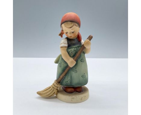 Features a lovely girl tidying up. Goebel Hummel backstamp. Issued: 20th centuryDimensions: 2''L x 2.75''W x 4.5''HManufactur