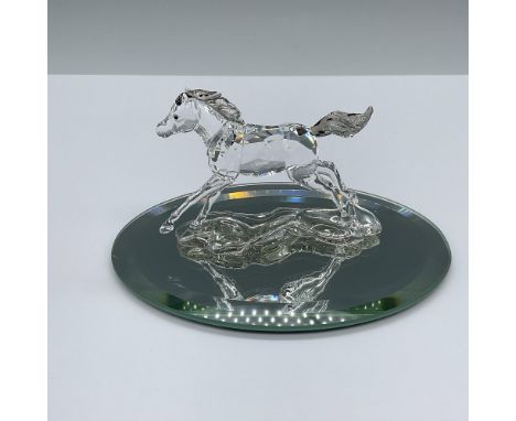 SCS 2014 Annual Edition. Crafted beautifully in a clear crystal and satin crystal mane and tail. The young horse stands on a 