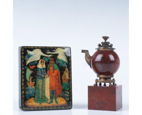The set features a small wooden lacquer box, hand-painted with a depiction of a Russian fable and signed in gold-toned paint.