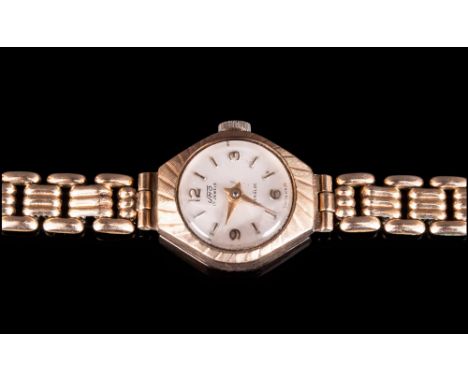 A Swiss 9ct Gold Cased Ladies Manual-Wind Wrist Watch. Attached to a 12ct Gold Plated Bracelet. In Working Order. 