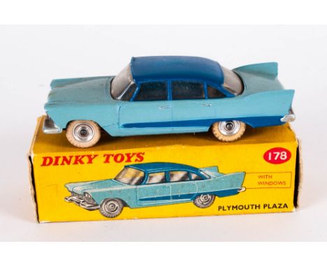 Dinky Toys No 178 Plymouth Plaza Diecast Model. Light blue body, dark blue roof and side flash, chrome spun hubs. red and yel