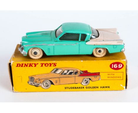 Dinky Toys No 169 Studebaker Golden Hawk Diecast Model - light green body, cream rear side panels and Trunk. Complete With Ye