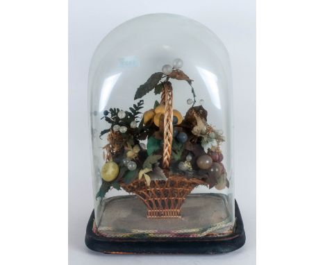 A Victorian Glass Globe With A Basket Of Wax Fruit Enclosed in the typical Victorian fashion of the day on a wood stand. 16''