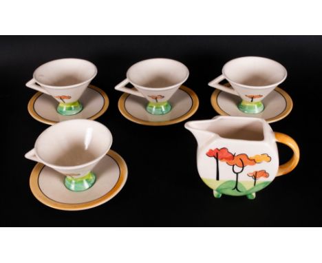 Porcelain Art Deco Style Part Tea Set comprising 4 cups & saucers with milk jug.