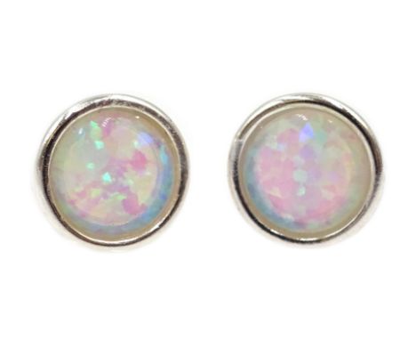 Pair of silver opal stud earrings, stamped 925 Condition Report & Further Details Click here for further images, condition, a