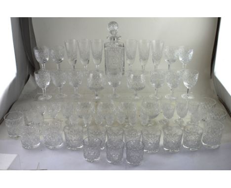 A large collection of matching Thomas Webb lead crystal drinking vessels including a decanter, six Champagne glasses, ten win