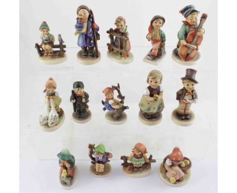 Fourteen Hummel Goebel figures, mostly late 20th century, boy with horn height approx 13cm (14).