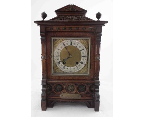 A Victorian oak architectural bracket clock by James Williams, Castle Street Liverpool, the architectural pediment with brass