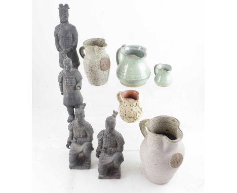 A small quantity of studio pottery jugs and four souvenir figures of Chinese Terracotta Army Warriors, one standing, two crou