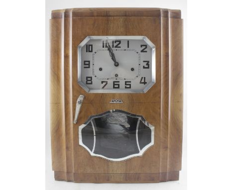 A French Art Deco walnut wall clock the silvered dial set with Arabic numerals, raised plaque to front, 'Axa Marque Deposee',