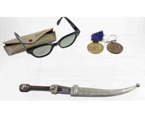 A mid-20th century horn handled Eastern dagger, overall length 30.5cm, in white metal scabbard, a pair of vintage 1960s sungl
