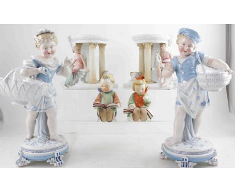 A pair of Neo-Classical bisque planters modelled as figures in Grecian dress amongst Classical ruins, height 37cm, a pair of 