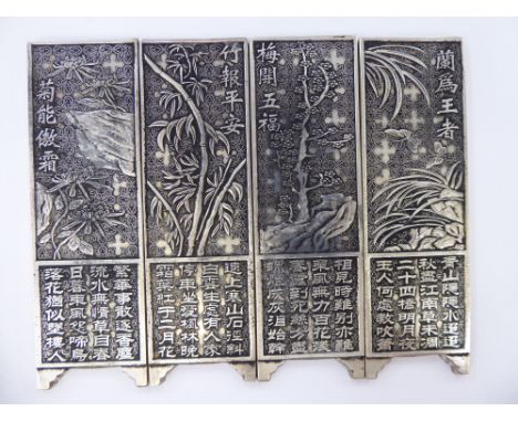 A set of four Chinese silver plated manuscript paperweight, fashioned as room screen panels  6''h      11