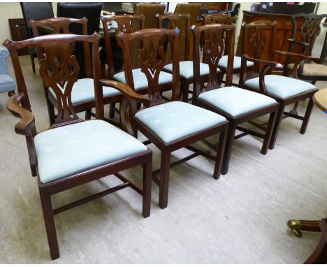 A set of eight modern Chippendale inspired mahogany framed splat back dining chairs, the fabric covered drop-in seats raised 