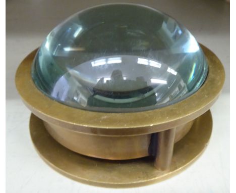 A modern compass with a domed magnifying glass  4''dia       OS2