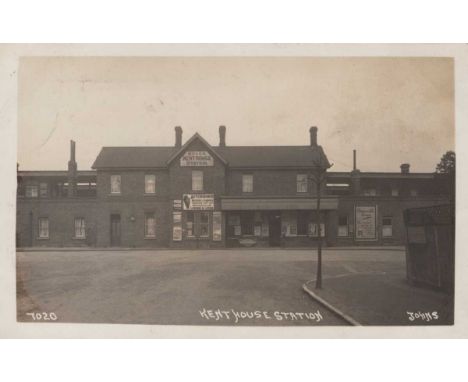Two albums containing approximately 320 postcards, the majority topographical views or artist postcards, including photograph