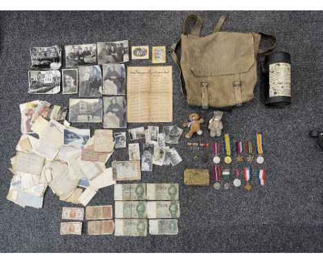 WWI and WWII Medals along with Military Bag, Flask, Photographs and others. 