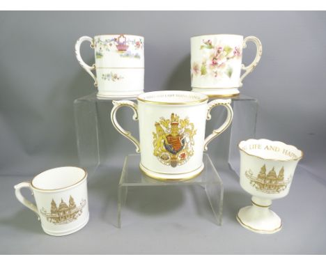 ROYAL WORCESTER - four China Commemorative mugs, one a twin-handled marriage loving cup 'Charles and Diana' and a China goble
