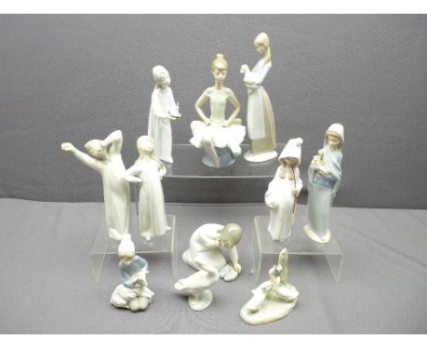 LLADRO AND NAO FIGURINES, an assortment (some evidence of repairs)