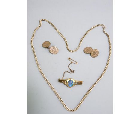 A 15CT GOLD ARTS &amp; CRAFTS OPAL BAR BROOCH, 5.5grms, a pair of oval floral decorated cufflinks and a 22in yellow metal cha