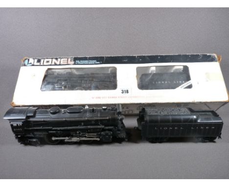 LIONEL ELECTRIC TRAINS O'GAUGE - a boxed Rock Island 0-4-0 locomotive and tender, Cab No 673 and an unboxed locomotive and te