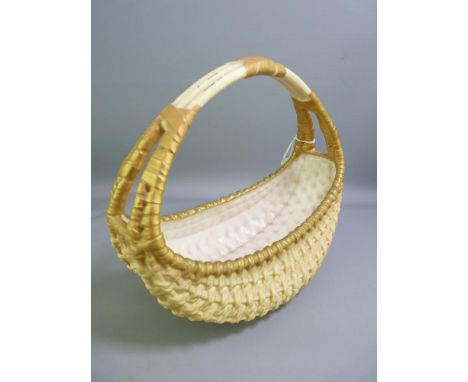 ROYAL WORCESTER - substantial boat shaped woven basket with single split-end handle, 1906, 25cms height, 25cms long NOTE:  IN