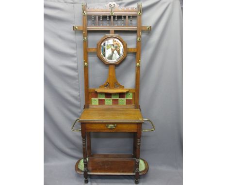 CIRCA 1900 OAK MIRRORED HALL STAND with brass hooks and side rails, single central drawer and lower shelf with shaped drip pa