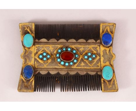 A TURKMAN INLAID COMB - inlaid with semi precious stones including lapis, turquoise and other, the body inlaid with a gold me