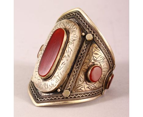 AN ISLAMIC METAL BANGLE, 6.5cm wide.