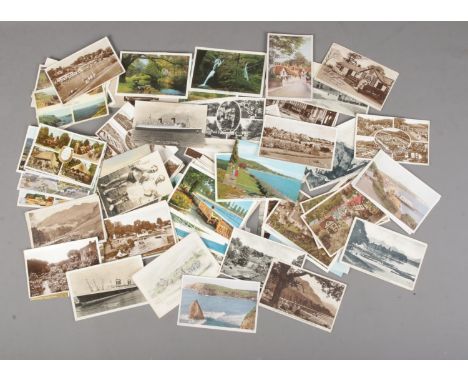 A small collection of vintage travel postcards of mainly photo landscape.  