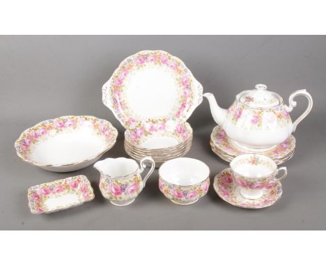 A Royal Albert part tea service in the Serena pattern to include teapot, milk jug, sugar bowl, etc. Approx. 17 pieces.  Gener