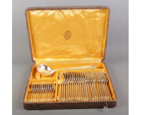 A silver-plated Art Deco set of cutlery in its original canteen, manufactured by the Orfevrerie Apollo of Paris during the Ar