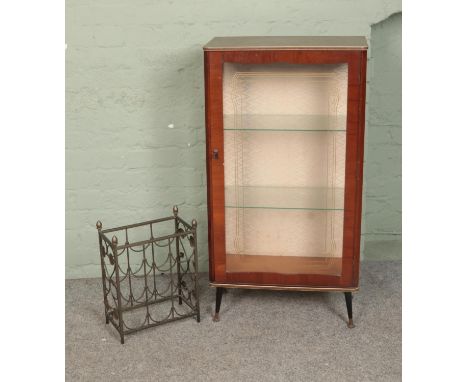 A vintage two-tier glazed display cabinet raised on tapered legs along with small floral wine rack.  