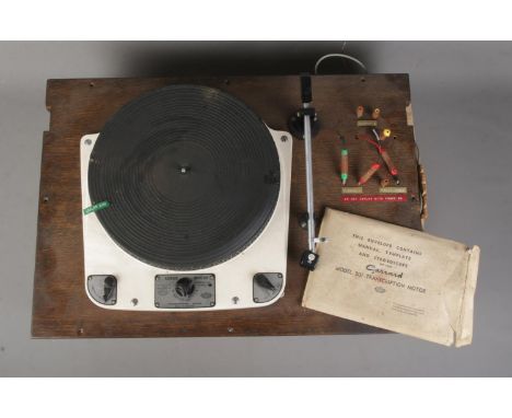 A Garrard Model 301 transcription motor turntable with original instruction manual.  