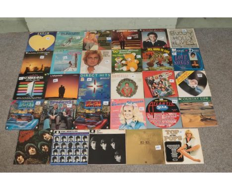 A collection of mainly rock and pop vinyl records, to include The Beatles, Michael Jackson, Diana Ross, Barry Manilow and Dr.