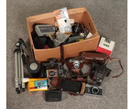 A box of photographic equipment. Includes Kodak, Polaroid, Coronet cameras, Pyramid tripod, Prinz colour viewer etc.  