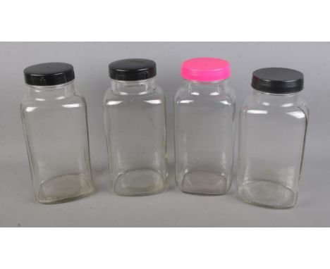 Four vintage glass sweet jars.  