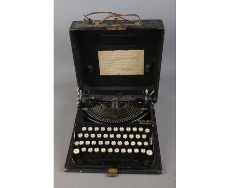A cased Remington Portable typewriter.  