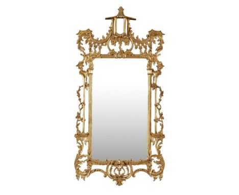 GEORGE III STYLE GILTWOOD MIRROR  20TH CENTURY   in the Chinese Chippendale style, the rectangular mirror plate in a giltwood