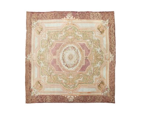 LARGE AUBUSSON CARPET  FRANCE, LATE 19TH CENTURY   the field with neoclassical design of cream medallion flanked by purple sc