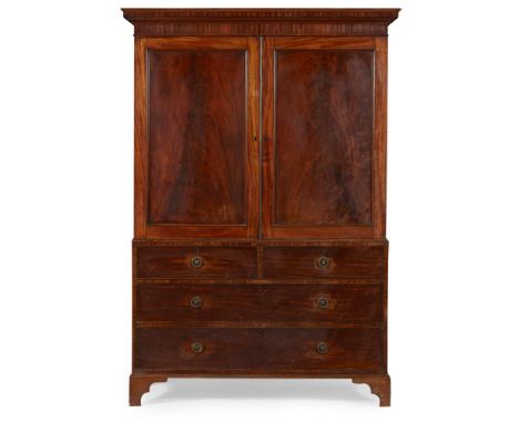 GEORGE III MAHOGANY LINEN PRESS  LATE 18TH CENTURY   the plain moulded cornice over a pair of panelled doors opening to hangi