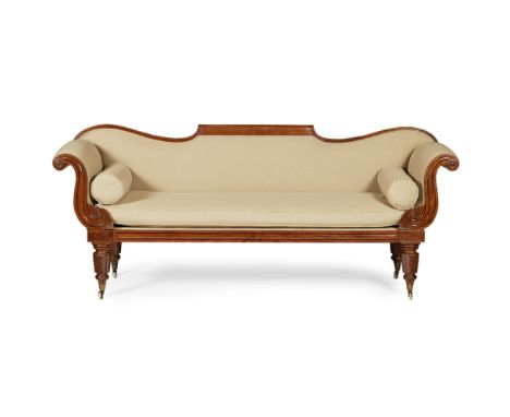 REGENCY MAHOGANY FRAMED SOFA  EARLY 19TH CENTURY   the scrolled low back above a long loose cushion seat with bolsters flanke