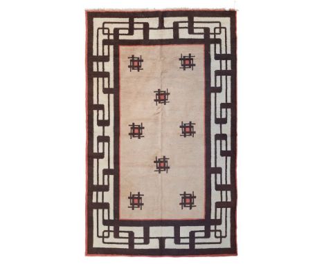 EUROPEAN ART DECO CARPET  EARLY 20TH CENTURY   the plain camel field with geometric motifs, within cream and brown geometric 