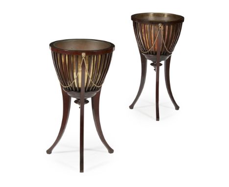 PAIR OF MAHOGANY AND BRASS JARDINIERES, BY JAMES SHOOLBRED & CO.  LATE 19TH CENTURY   in the Georgian style, of slatted urn f