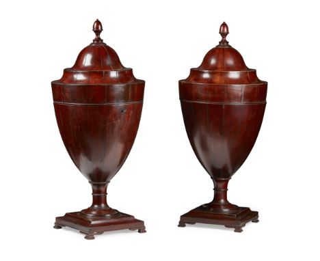 PAIR OF GEORGE III MAHOGANY CUTLERY URNS  LATE 18TH CENTURY   the moulded domed tops with acorn finials above tapered bodies 