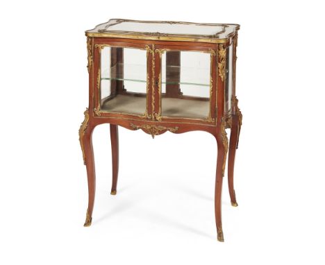 LOUIS XV STYLE KINGWOOD BIJOUTERIE TABLE  19TH CENTURY   the shaped brass-banded rectangular top with a bevelled glass insert