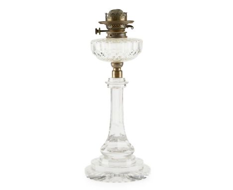 CUT CRYSTAL PARAFFIN LAMP  19TH CENTURY   the facet cut reservoir above a spreading facetted stem and circular stepped base  