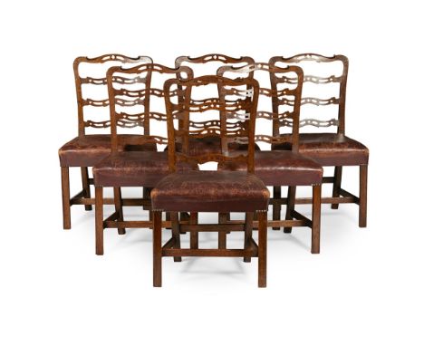 SET OF SIX SCOTTISH GEORGE III STYLE OAK DINING CHAIRS, AFTER A DESIGN BY YOUNG & HAMILTON  19TH CENTURY   the pierced ladder