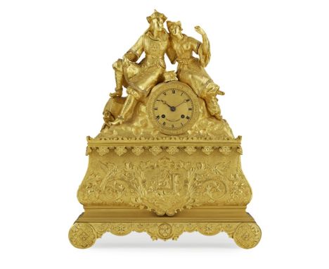 FRENCH GILT METAL MANTEL CLOCK, DUPONT, PARIS  19TH CENTURY   the signed circular gilt dial with Roman numbers set in a rockw