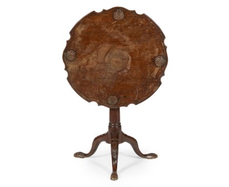 GEORGE III MAHOGANY BIRDCAGE TEA TABLE  18TH CENTURY   the shaped circular dished top carved with shells, on a birdcage and r